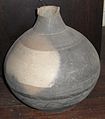 Roman cinerary urn of Alice Holt ware, 2nd century AD, excavated from Kingsley, Hampshire.