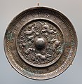 Tang dynasty bronze mirror with sea beast and grape decoration