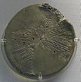 Part of a circular clay tablet with depictions of constellations (planisphere)