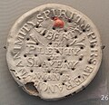 Biscuit commemorating the abolition of slavery, inscribed "Liberty and Plenty or Slavery and Want". 1834. England. AN1938.15.