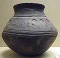 Pottery cremation urn from Loveden Hill, with runic inscription