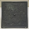 Bronze mirror depicting a puppet show