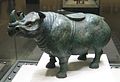 Bronze wine vessel (zun) in the shape of a rhinoceros, with gold and silver inlaid cloud designs (Western Han)