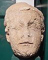 Limestone head from a statue of a saint or bishop, from Reading Abbey. 13th century. Reading Museum object no. 1991.1.569.